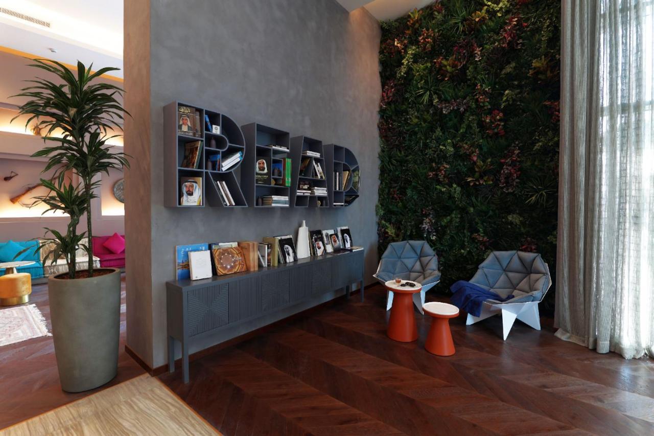 Pullman Sharjah Hotell Exteriör bild Living wall in a private home