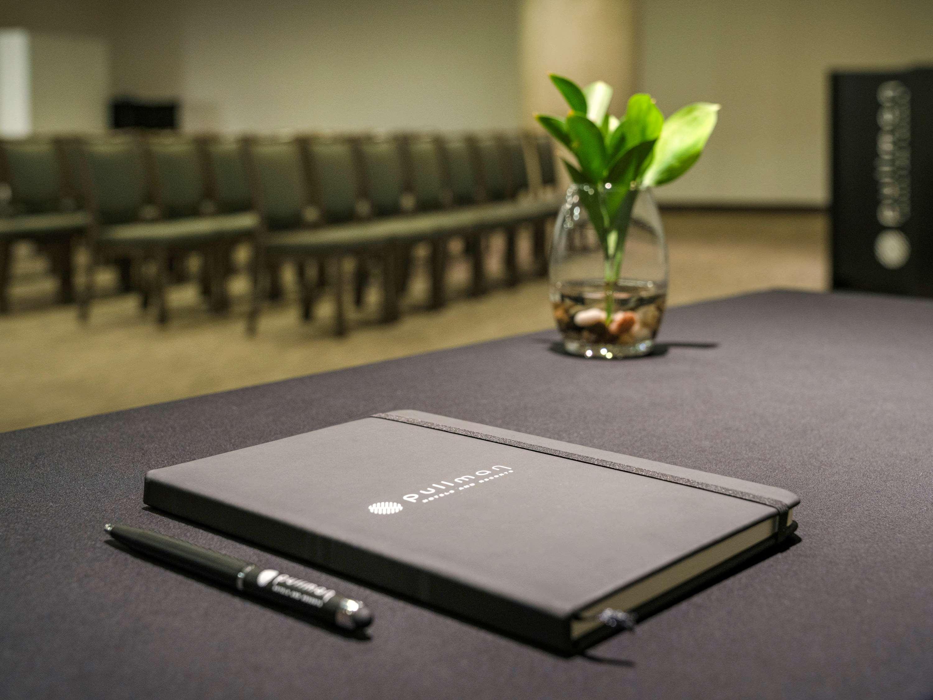 Pullman Sharjah Hotell Exteriör bild A meeting room at the University of St. Gallen